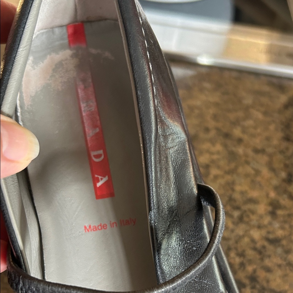Prada Black Leather Loafers with White Stitching